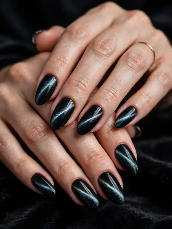 Black velvet cat-eye black wedding nails with magnetic shimmer