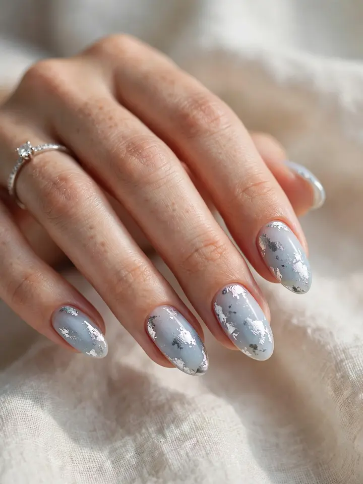 Ice blue wedding nails with silver foil flakes