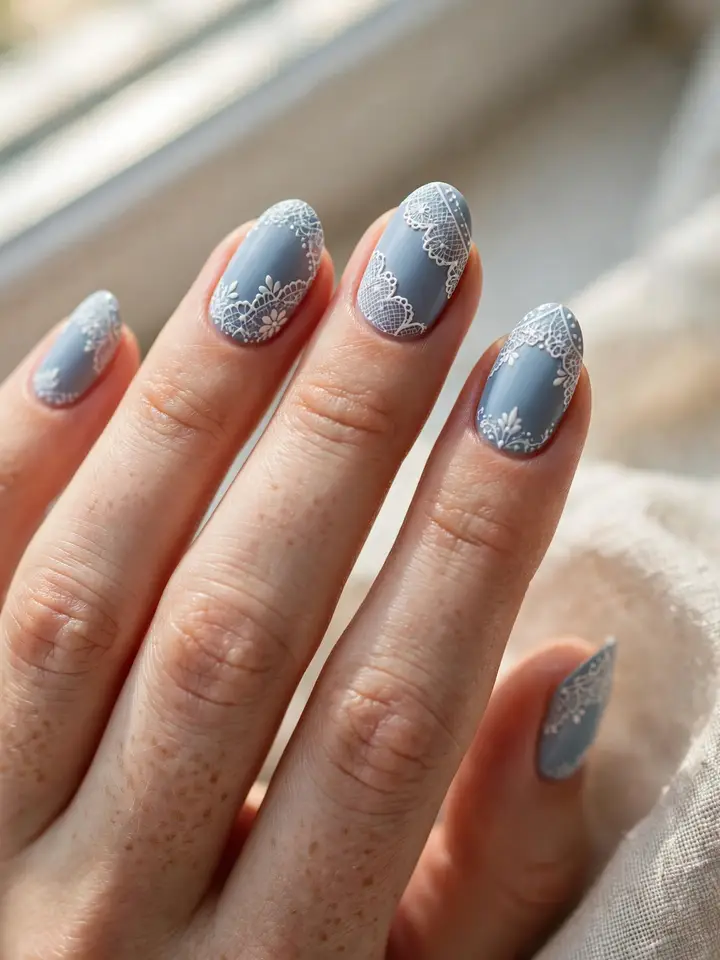 Blue wedding nails with white lace nail art detail