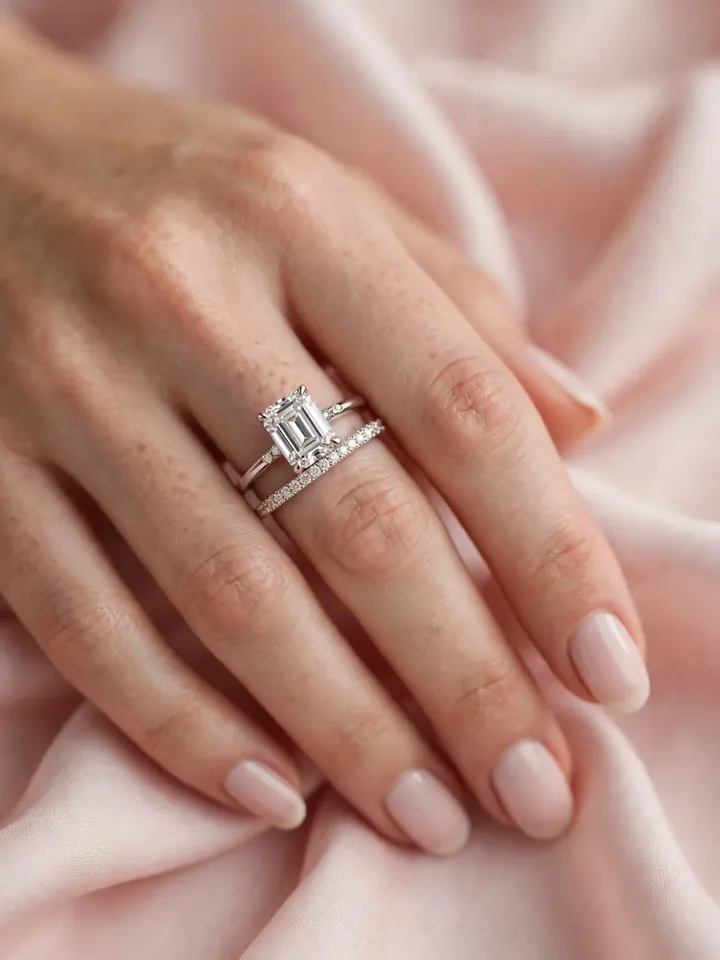 Wedding bands for emerald cut rings — emerald-cut engagement ring with a sparkling pavé diamond wedding band